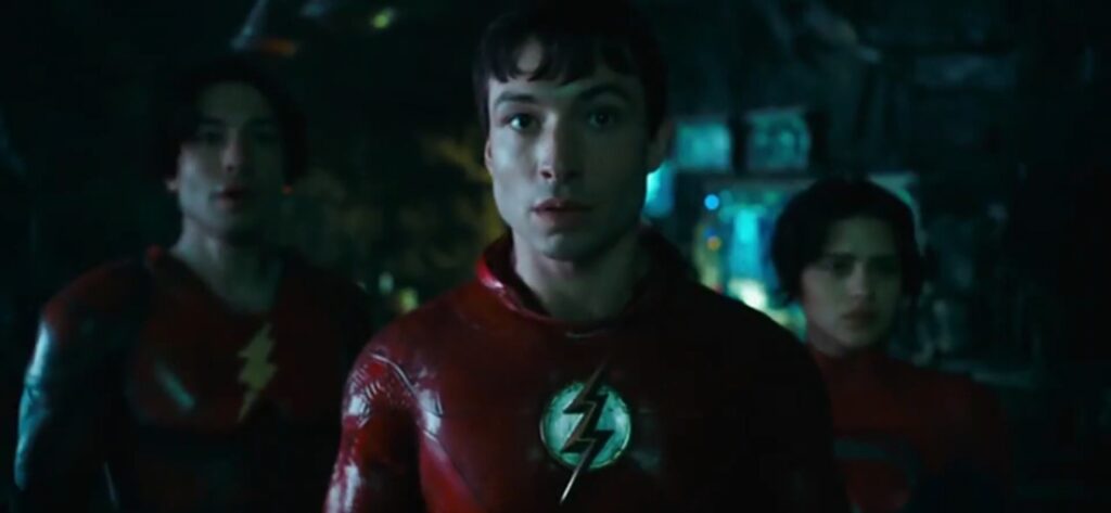 the Flash :- Ezra Miller as Barry Allen / The Flash , Sasha Calle as Supergirl (Credit - Warner Bros.)