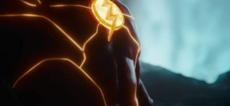 the Flash :- Ezra Miller as Barry Allen / The Flash logo (Credit - Warner Bros.)